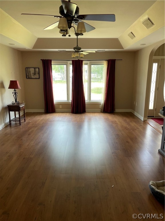5413 Gatebridge Road Richmond, VA 23234 - Photo 2 of 16 an empty room with wooden floor and windows