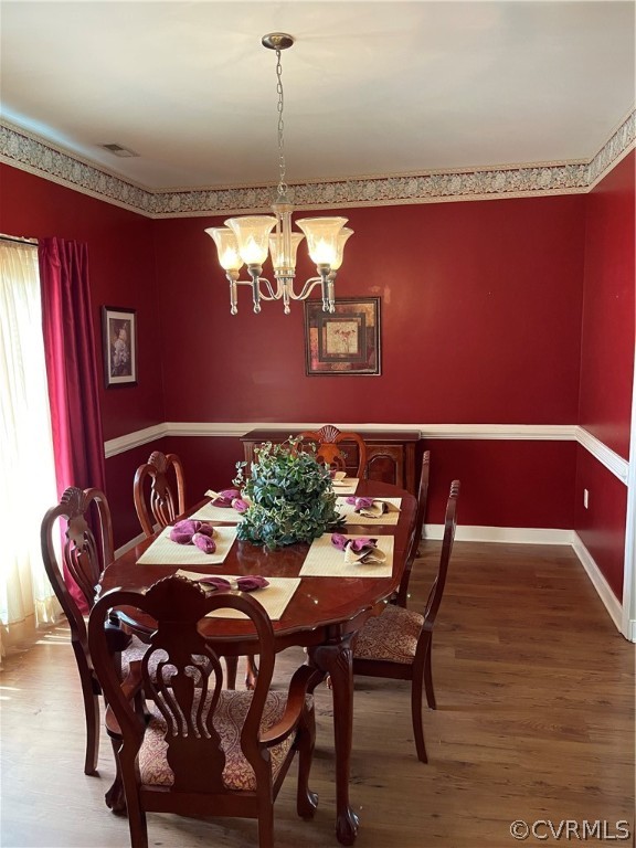 5413 Gatebridge Road Richmond, VA 23234 - Photo 3 of 16 a view of a dining room with furniture and chandelier