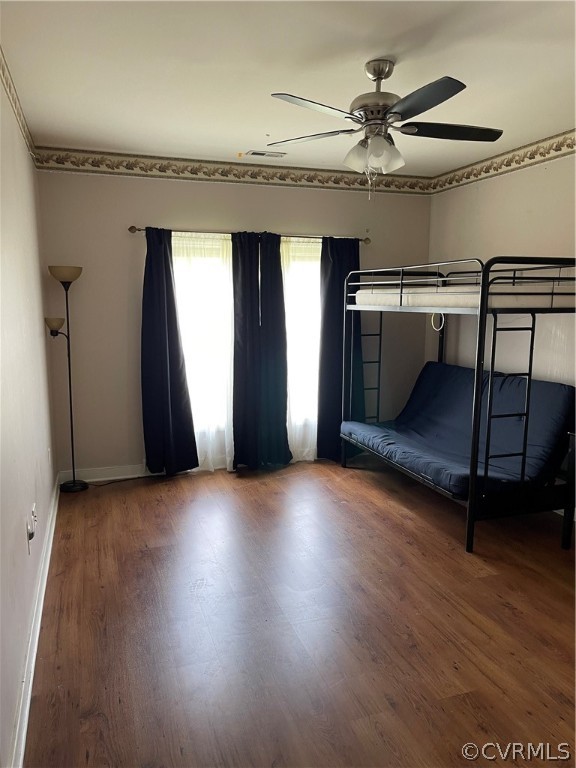 5413 Gatebridge Road Richmond, VA 23234 - Photo 7 of 16 an empty room with windows and fan
