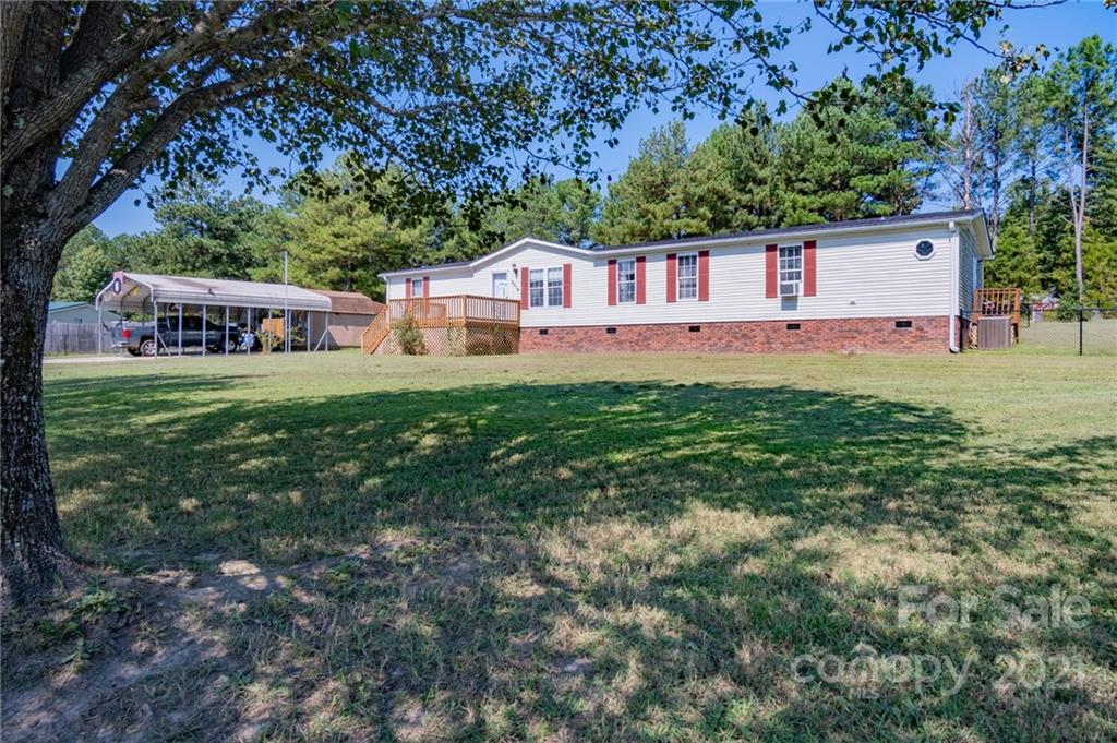 3014 Anderson Road South Catawba, SC 29704 - Photo 1 of 21 a front view of a house with garden
