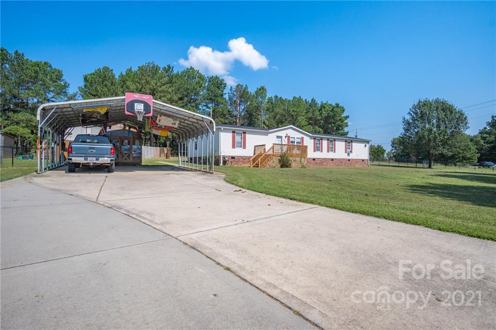 3014 Anderson Road South Catawba, SC 29704 - Photo 2 of 21 a house view with a garden space