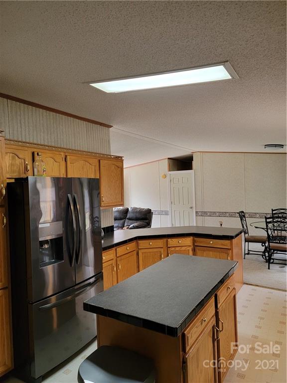3014 Anderson Road South Catawba, SC 29704 - Photo 11 of 21 a kitchen with stainless steel appliances granite countertop a refrigerator a sink and a stove