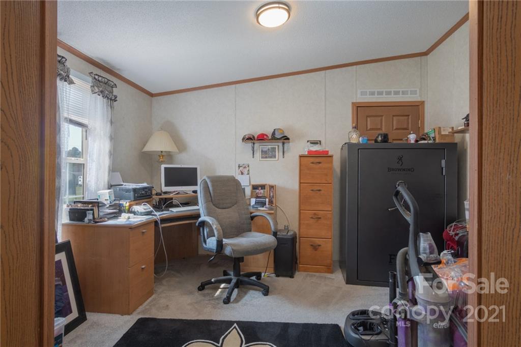 3014 Anderson Road South Catawba, SC 29704 - Photo 20 of 21 a view of a workspace with furniture and a window