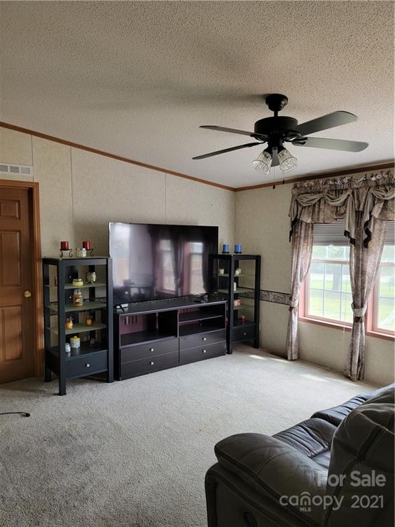 3014 Anderson Road South Catawba, SC 29704 - Photo 8 of 21 a living room with furniture and a flat screen tv