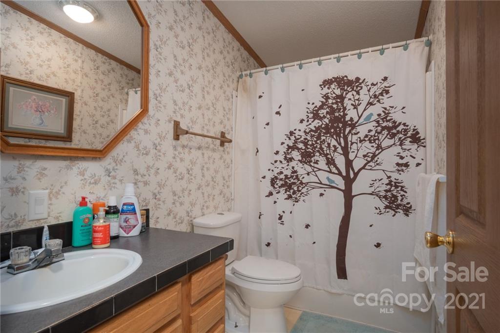3014 Anderson Road South Catawba, SC 29704 - Photo 10 of 21 a bathroom with a sink toilet and a mirror