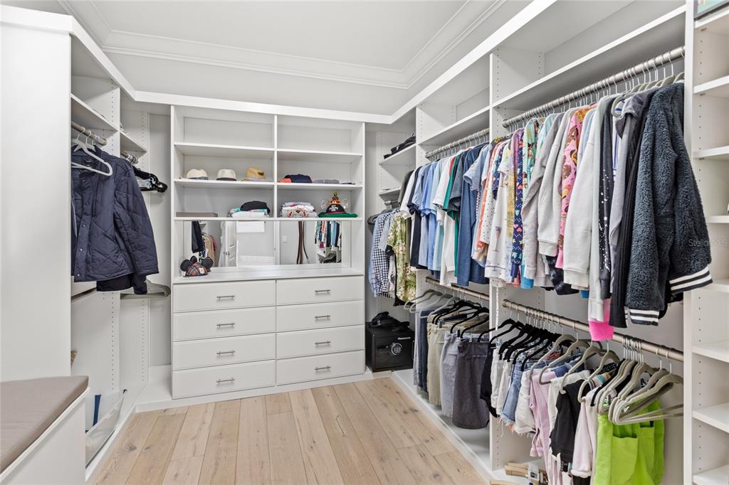 10224 Mattraw Place Orlando, FL 32836 - Photo 18 of 43 a view of walk in closet with clothes