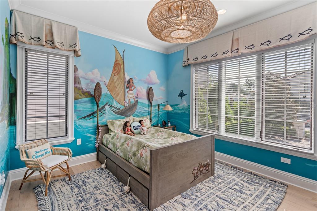 10224 Mattraw Place Orlando, FL 32836 - Photo 19 of 43 a bedroom with a bed and a window