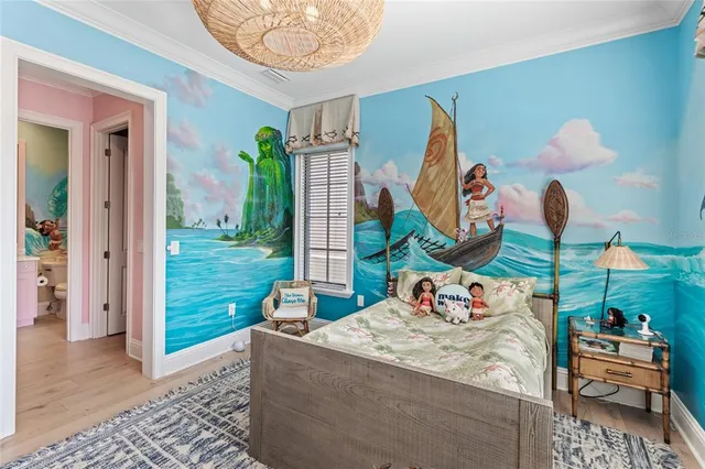 a bedroom with a bed and balcony view