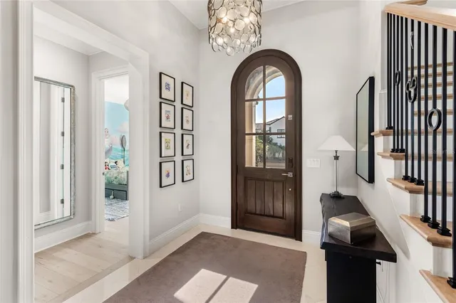 a view of entryway with wooden floor