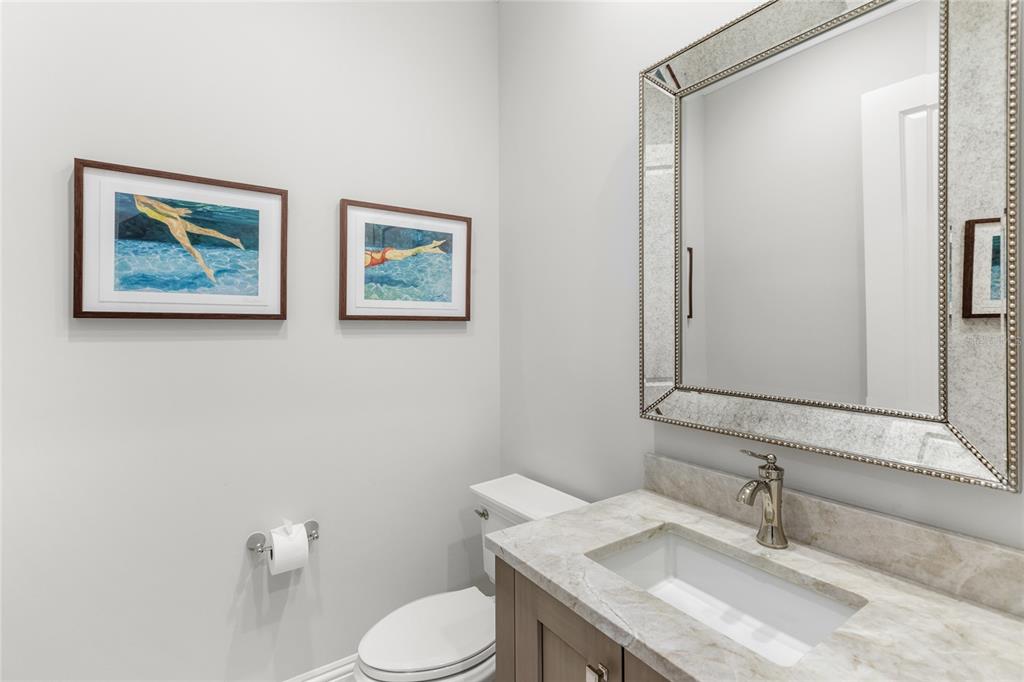 10224 Mattraw Place Orlando, FL 32836 - Photo 33 of 43 a bathroom with a granite countertop sink mirror and toilet