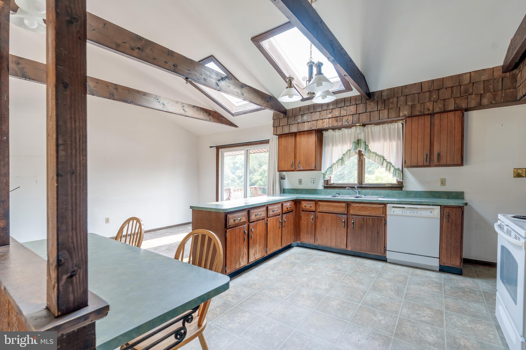 121 Plum Point Road Elkton, MD 21921 - Photo 8 of 23 Bright, sunny kitchen w/ skylights & breakfast bar