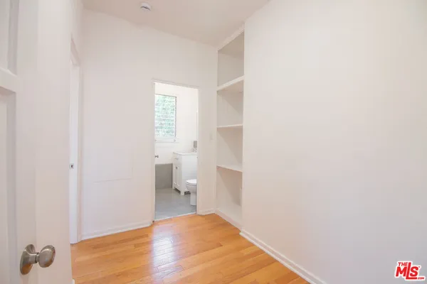a view of a bathroom with toilet