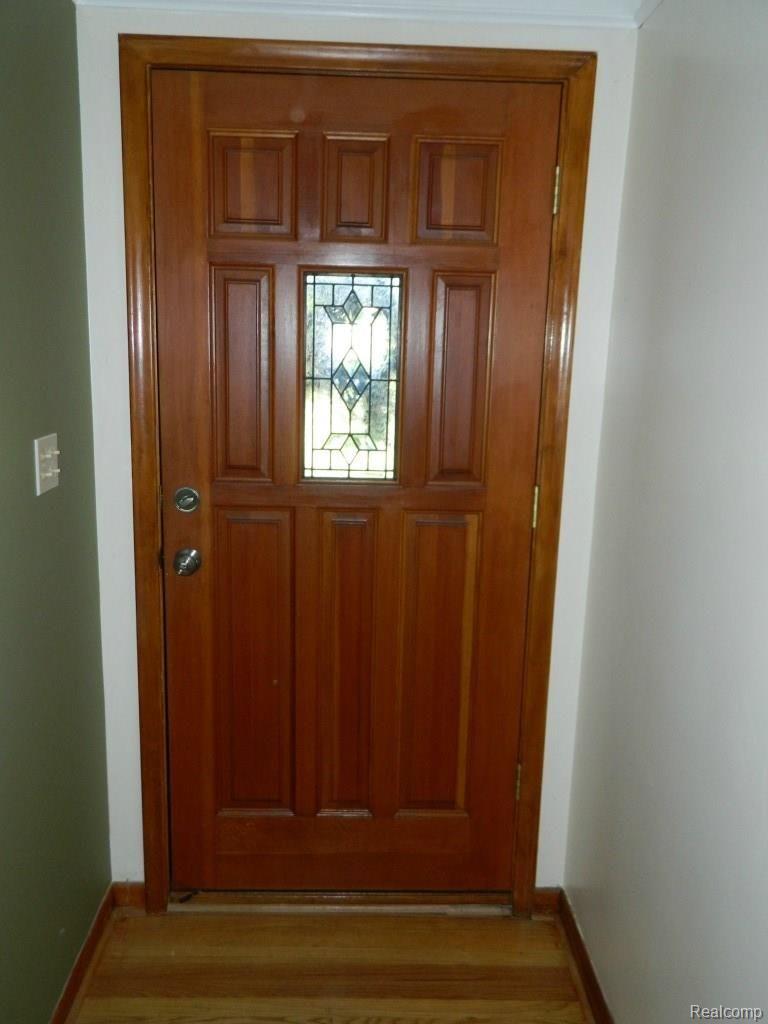 9270 Church Road Grosse Ile, MI 48138 - Photo 20 of 24 Wood Entry Door