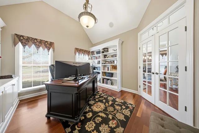 a living room with a couch and a window