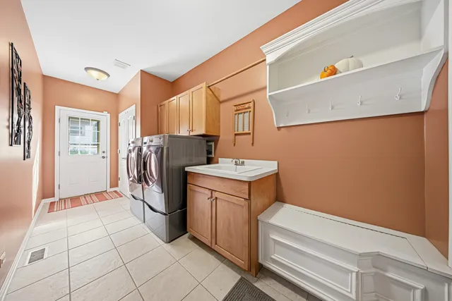 a living room with furniture window and a flat screen tv