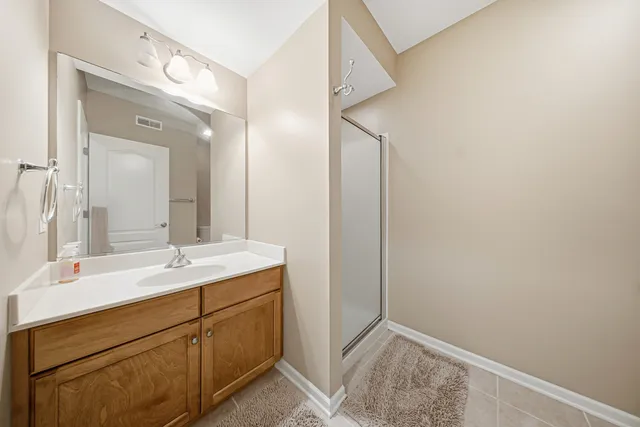a view of a chair and table in a yard