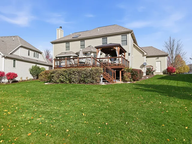 a view of a lake with a big yard
