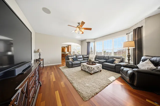 a living room with furniture fireplace and a flat screen tv