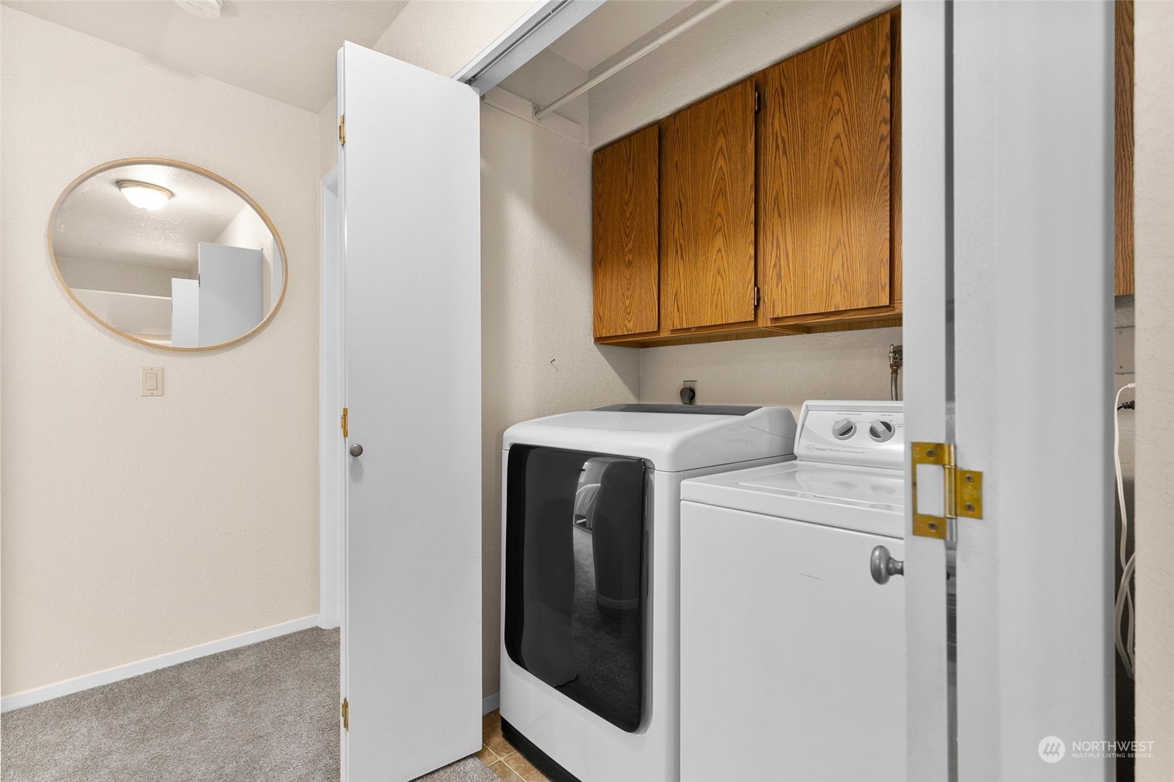 13626 Northeast 7th Street, Unit F16 Bellevue, WA 98005 - Photo 18 of 22 a utility room with dryer and washer