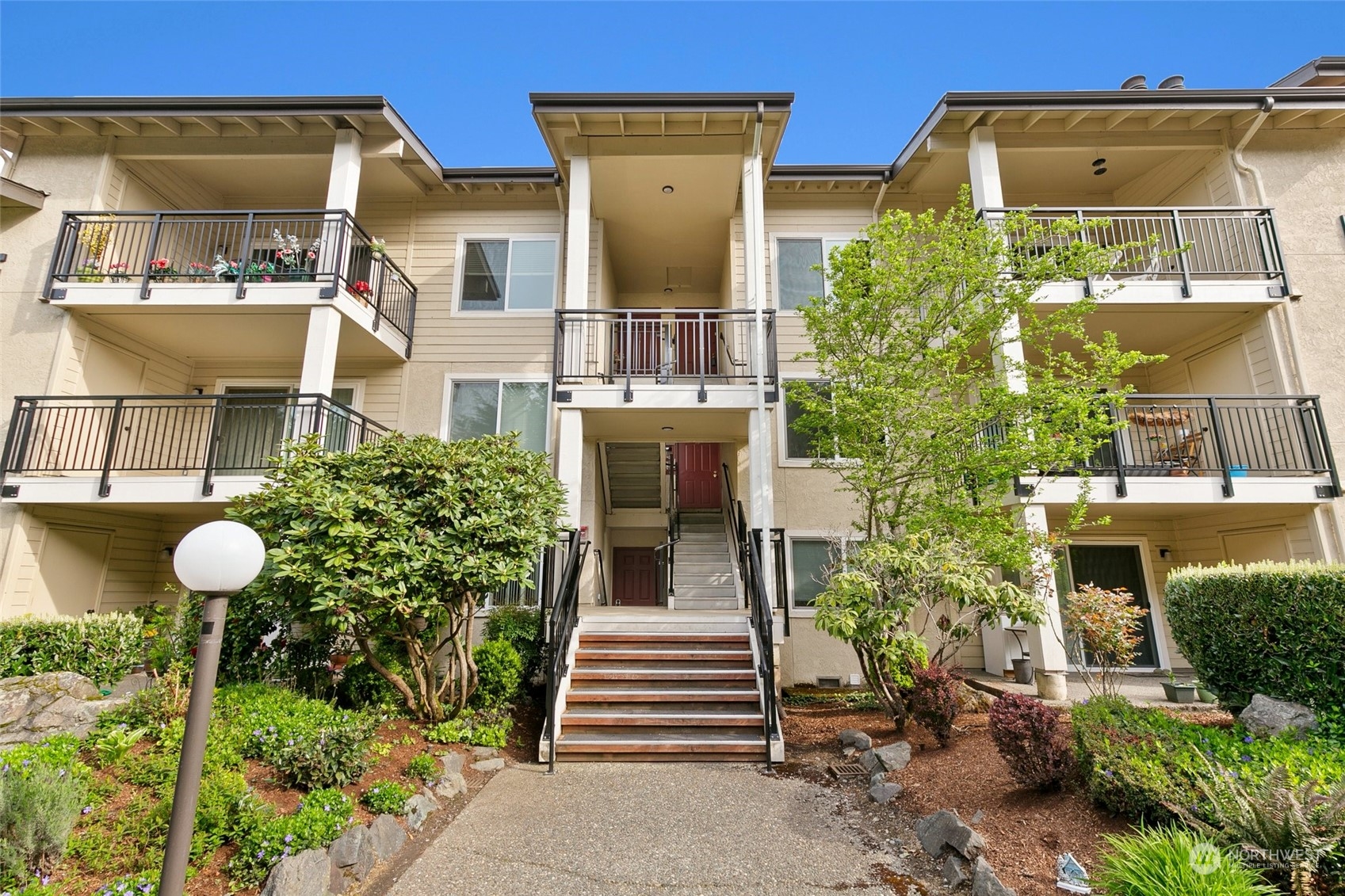 13626 Northeast 7th Street, Unit F16 Bellevue, WA 98005 - Photo 21 of 22 a front view of a house