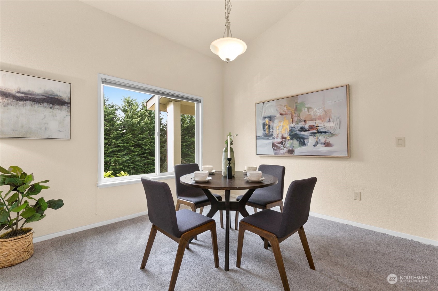 13626 Northeast 7th Street, Unit F16 Bellevue, WA 98005 - Photo 6 of 22 a dining room with furniture and window