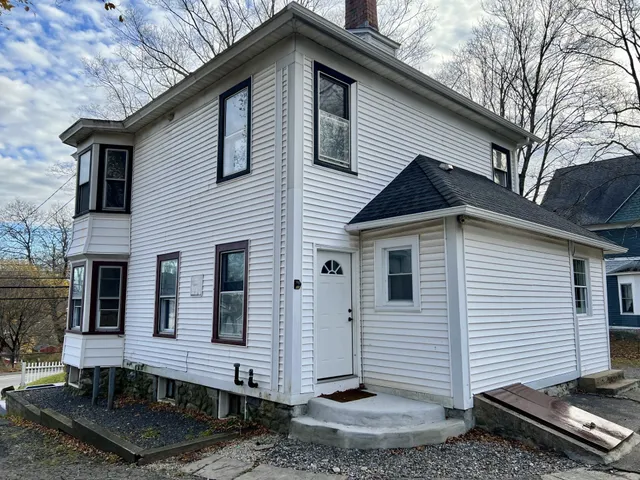 a front view of a house with entertaining space