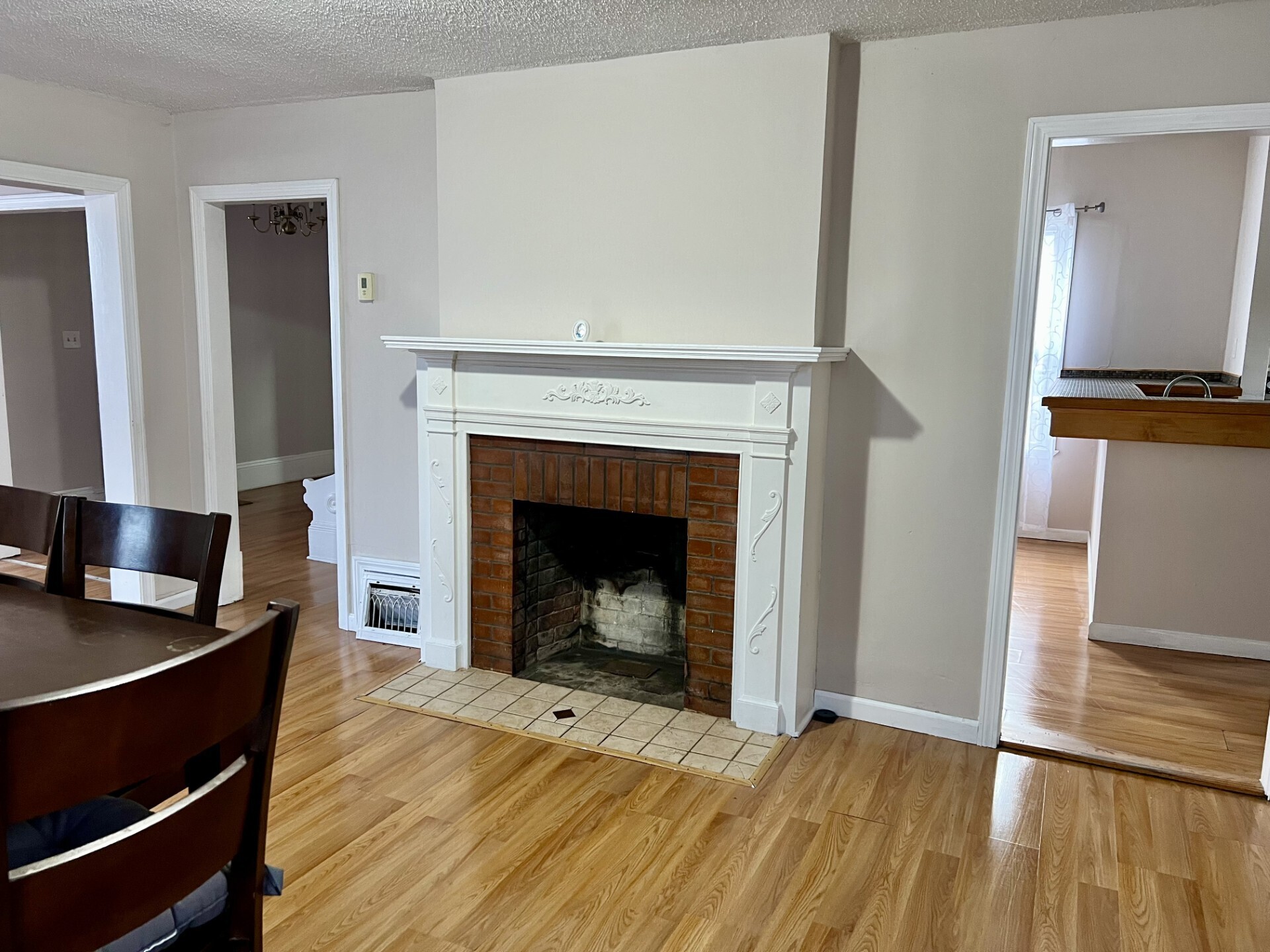 435 Windham Road Windham, CT 06226 - Photo 8 of 20 a living room with furniture and a fireplace