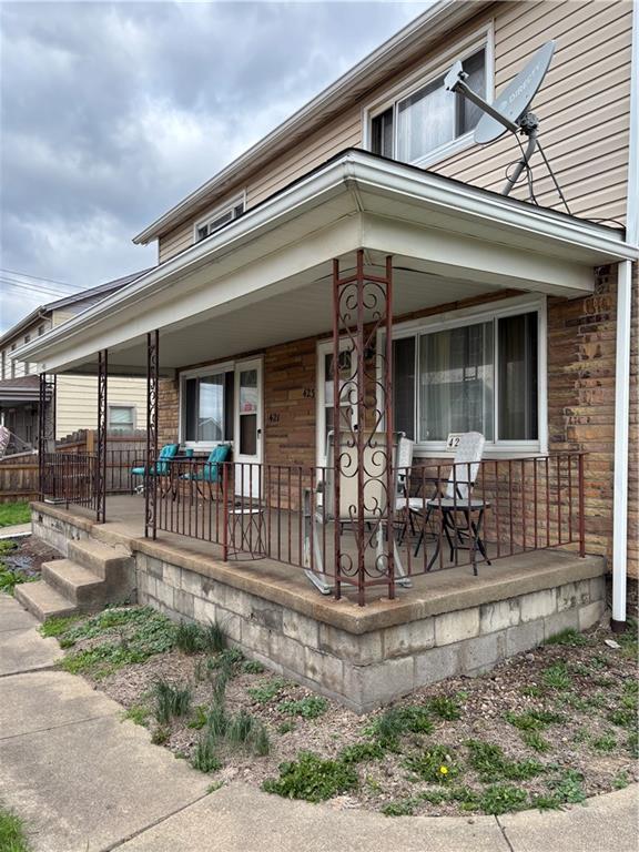 421-423 Georgetown Road Lawrence, PA 15055 - Photo 17 of 27 front view of a house with a porch