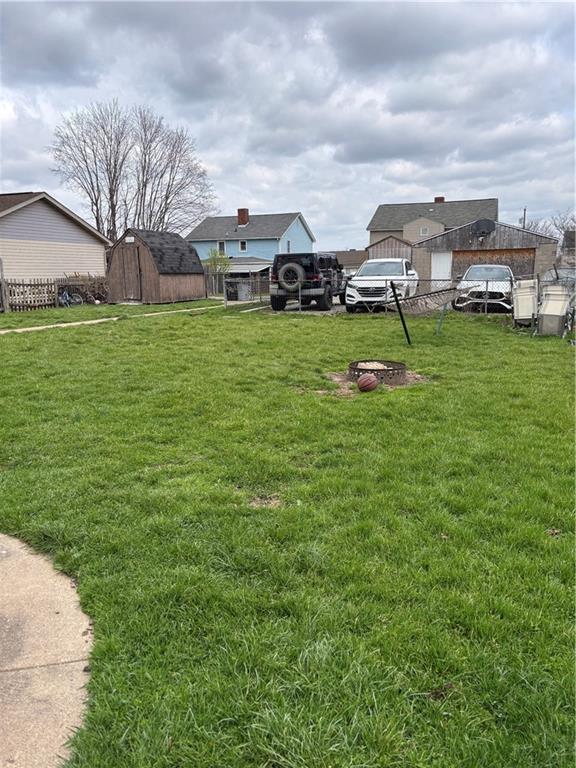 421-423 Georgetown Road Lawrence, PA 15055 - Photo 3 of 27 a view of a house with a big yard and sitting area