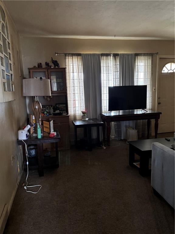 421-423 Georgetown Road Lawrence, PA 15055 - Photo 8 of 27 a living room with furniture and a flat screen tv