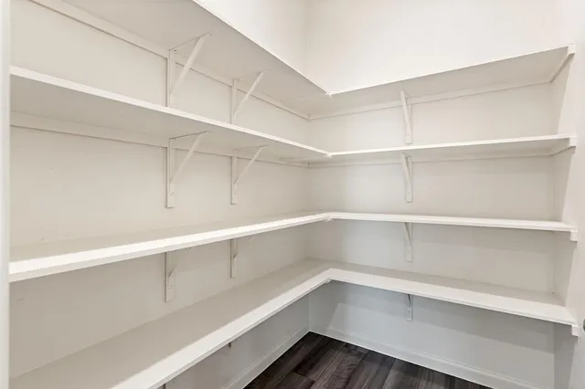 a view of an empty walk in closet