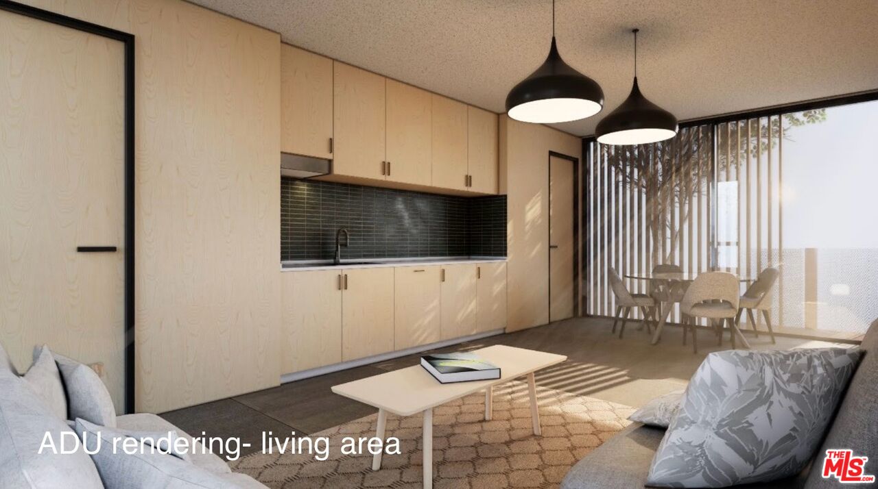 732 Brooks Avenue Venice, CA 90291 - Photo 28 of 28 a living room with furniture and a flat screen tv