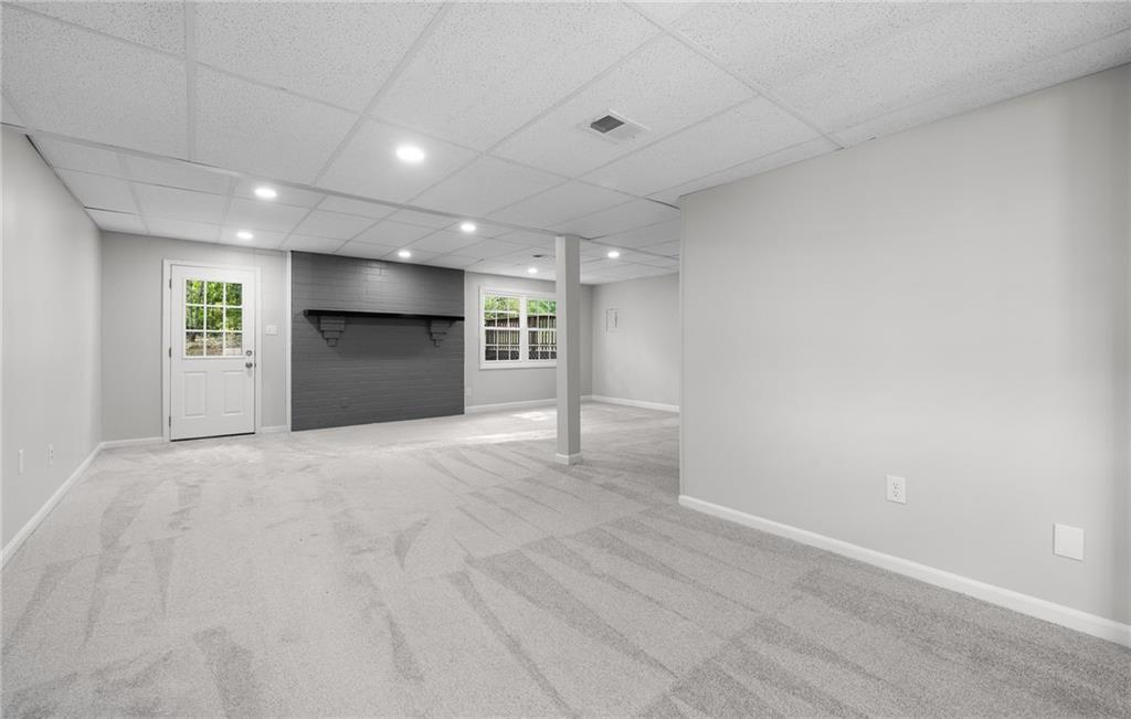 4510 Virginia Avenue Kennesaw, GA 30144 - Photo 27 of 54 a view of empty room with wooden floor