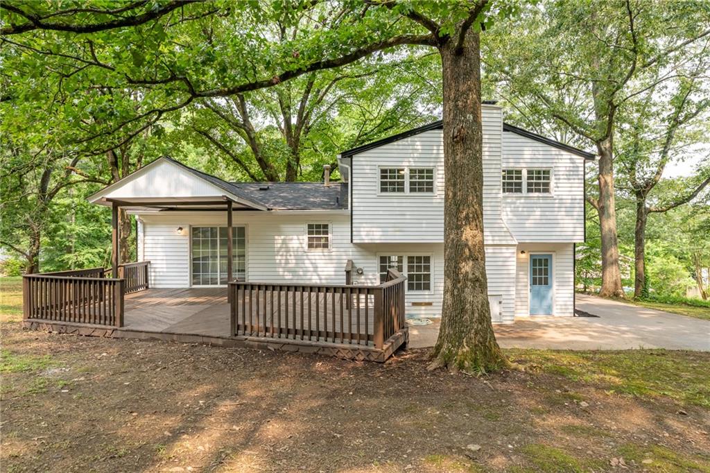 4510 Virginia Avenue Kennesaw, GA 30144 - Photo 44 of 54 a front view of a house with garage