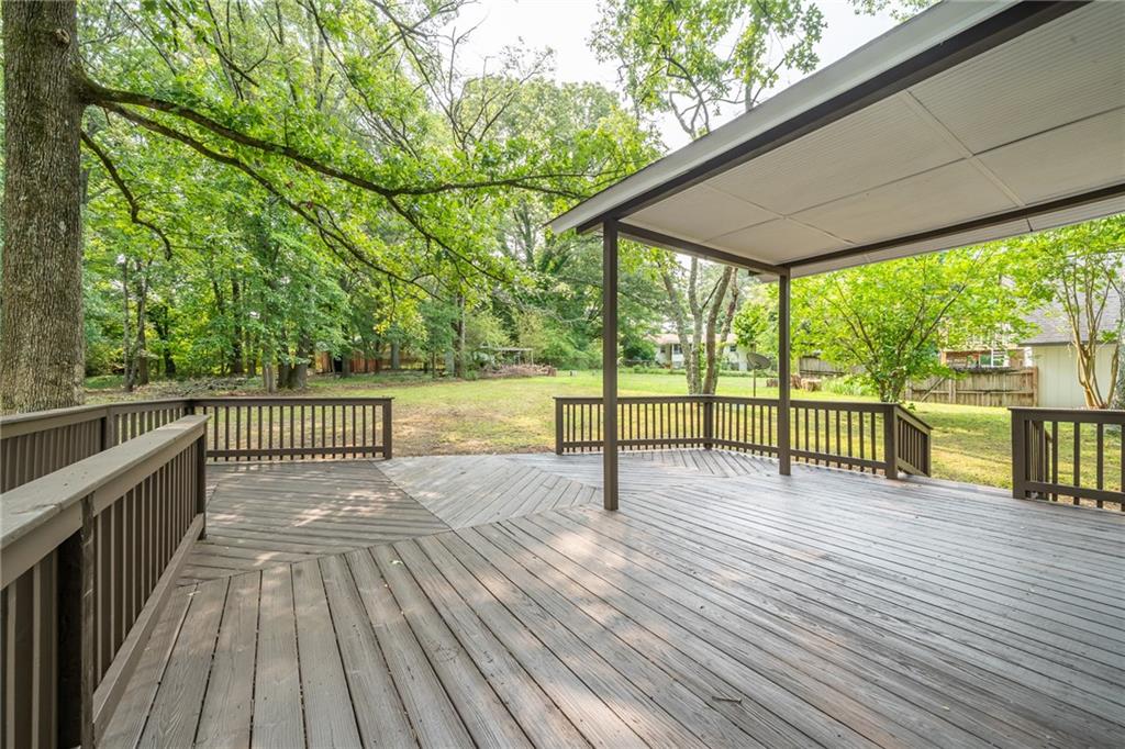 4510 Virginia Avenue Kennesaw, GA 30144 - Photo 53 of 54 a view of porch with wooden floor and fence