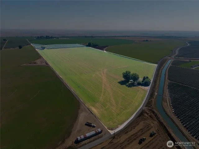 a view of a balcony with floor to ceiling windows