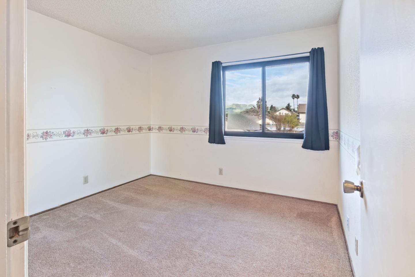 88 River Drive King City, CA 93930 - Photo 14 of 15 an empty room with a window