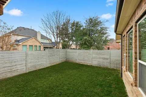 a view of a back yard of the house