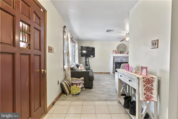 a room with furniture a washer and dryer