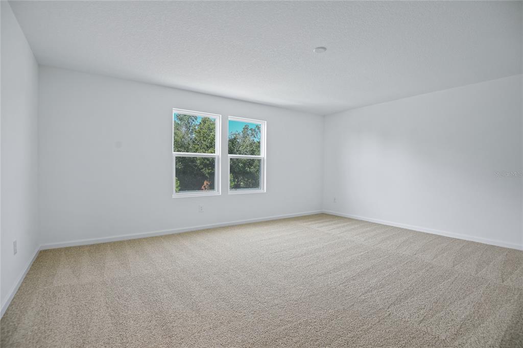 6168 Southwest 64th Terrace Ocala, FL 34474 - Photo 15 of 24 an empty room with window