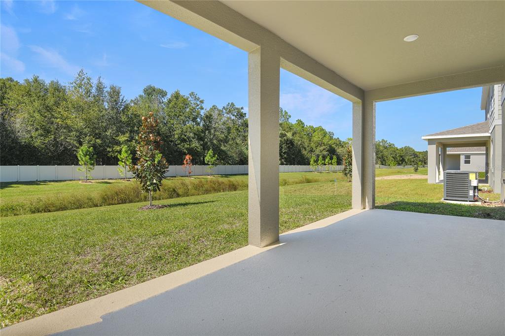 6168 Southwest 64th Terrace Ocala, FL 34474 - Photo 20 of 24 a view of a house with backyard