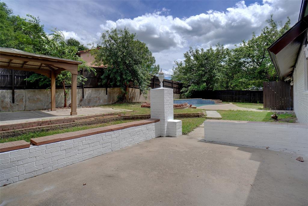 8900 Random Road Fort Worth, TX 76179 - Photo 16 of 18 a view of a backyard with swimming pool