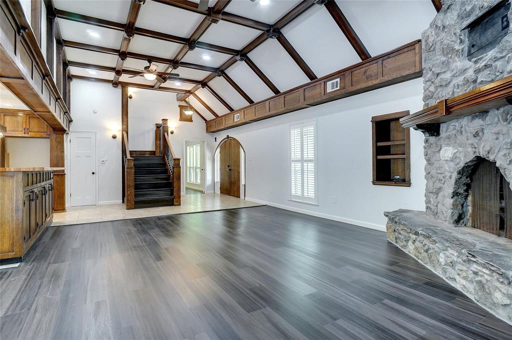 8900 Random Road Fort Worth, TX 76179 - Photo 3 of 18 a view of empty room with wooden floor and fireplace