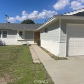 a house view with a backyard space