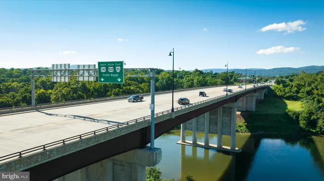 a view of swimming pool from a balcony