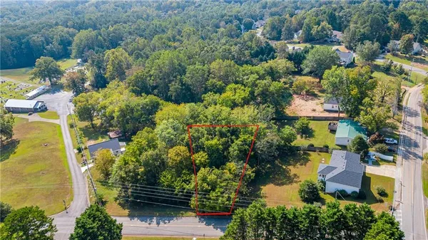 an aerial view of a house with a garden