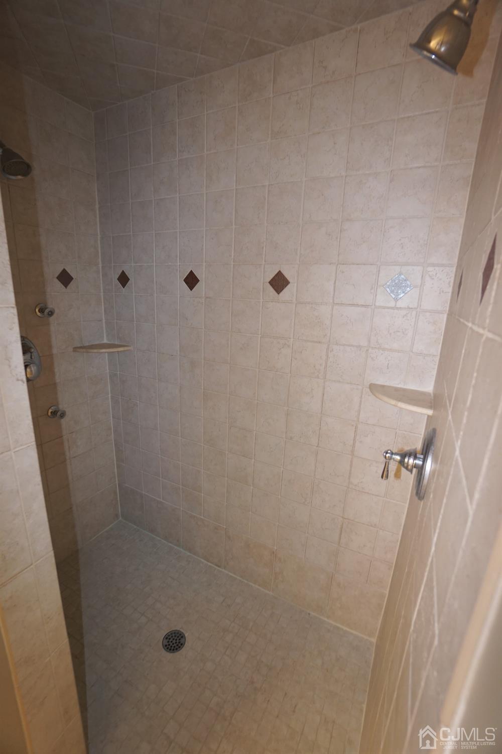 164 Normandy Road Colonia, NJ 07067 - Photo 24 of 47 a bathroom with a shower