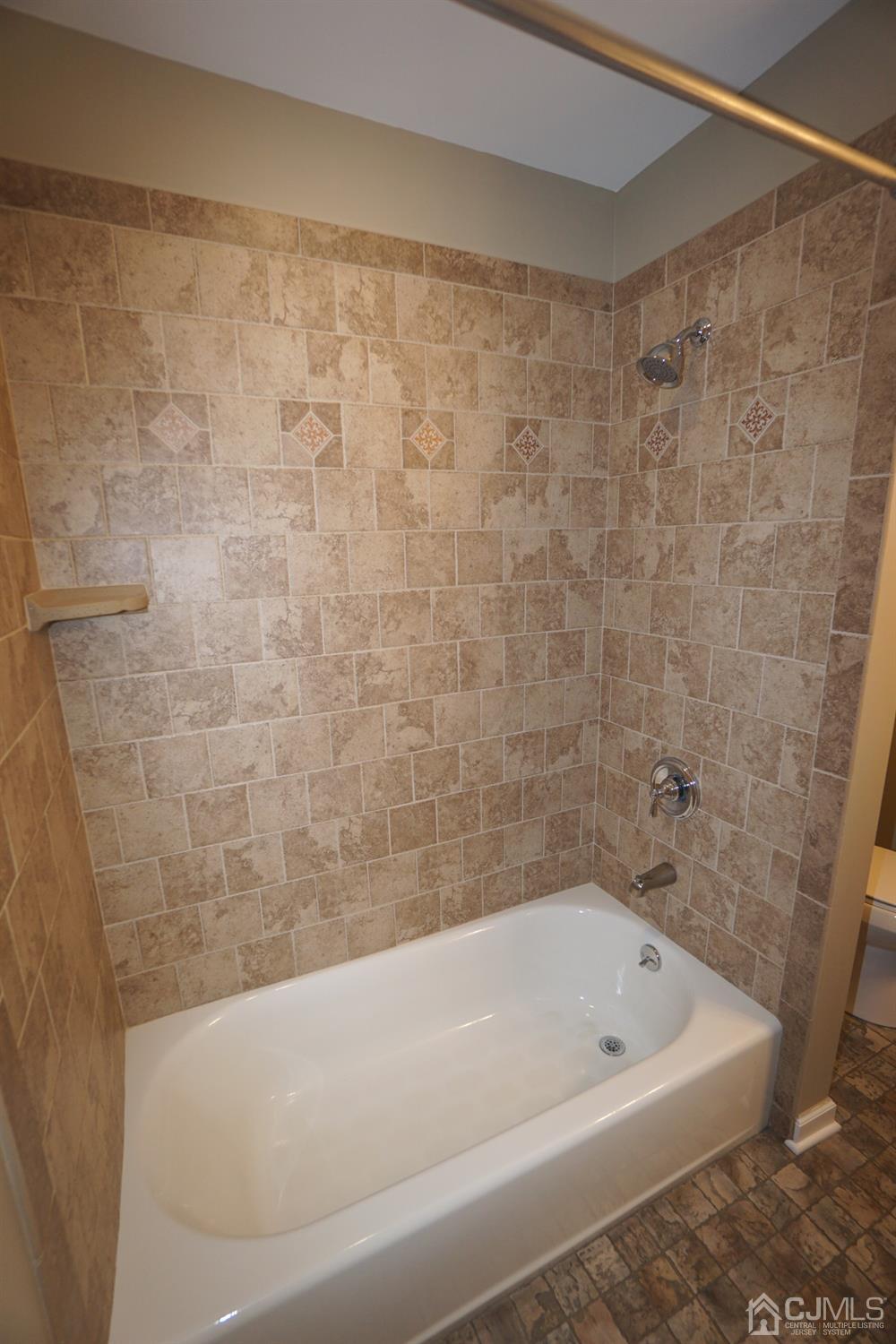 164 Normandy Road Colonia, NJ 07067 - Photo 37 of 47 a bathroom with a bathtub