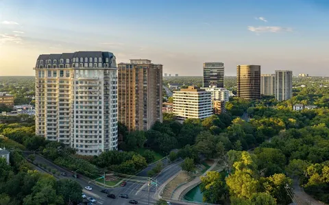 a view of a city with tall buildings