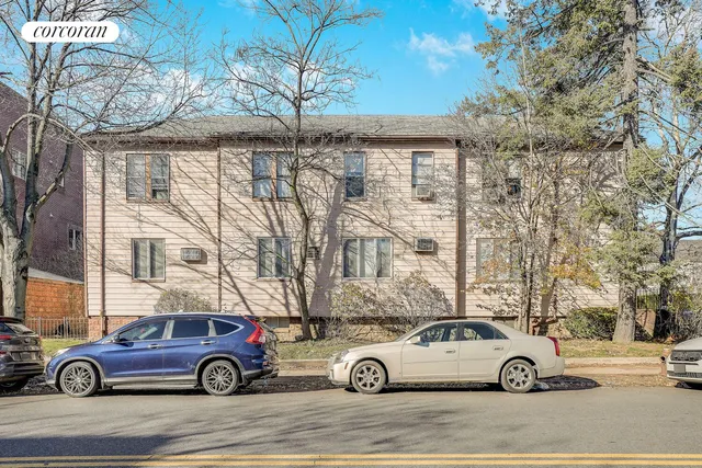 a car parked in front of a house
